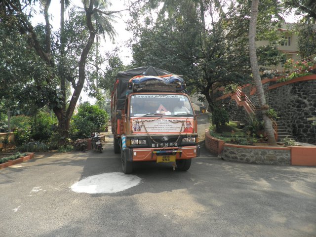 Vehicle with Sacred Earth and Water arriving at the Ashram